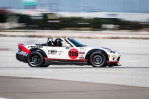 RPM Agency Mazda Race Car racing on track