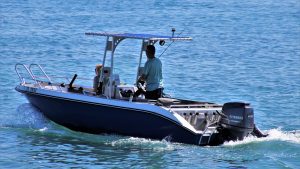 Sport fishing boat on the water with two occupants